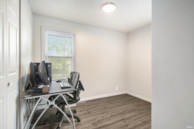 1024 S Lombardy Dr, South Bend, IN 46619 - office area with wood finished floors, baseboards, and a textured ceiling