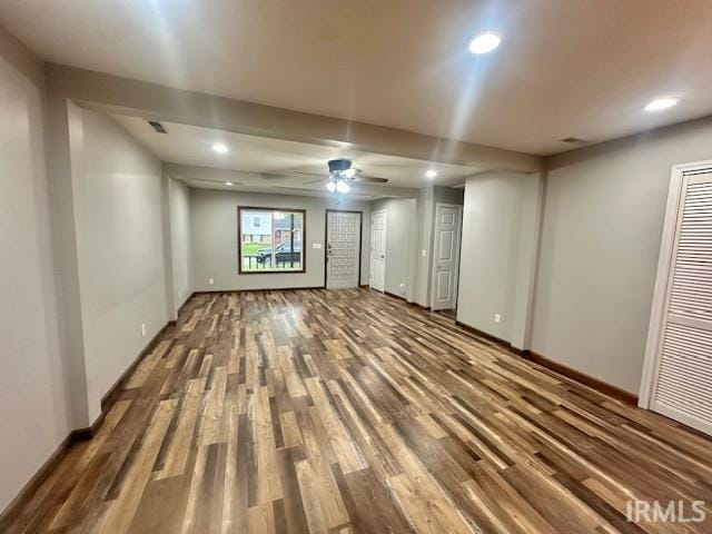 2200 Dakota Dr, Lafayette, IN 47909 - basement featuring wood finished floors, recessed lighting, ceiling fan, baseboards, and a heating unit
