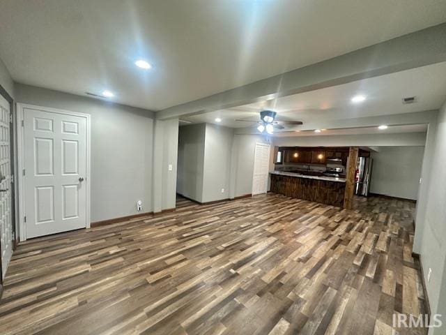 2200 Dakota Dr, Lafayette, IN 47909 - unfurnished living room featuring wood finished floors, a ceiling fan, recessed lighting, and baseboards