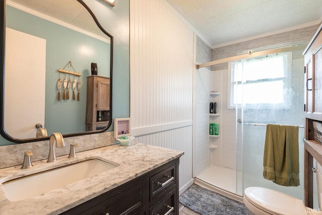 3907 N Caldwell Rd, Paragon, IN 46166 - bathroom featuring a stall shower, vanity, ornamental molding, and toilet
