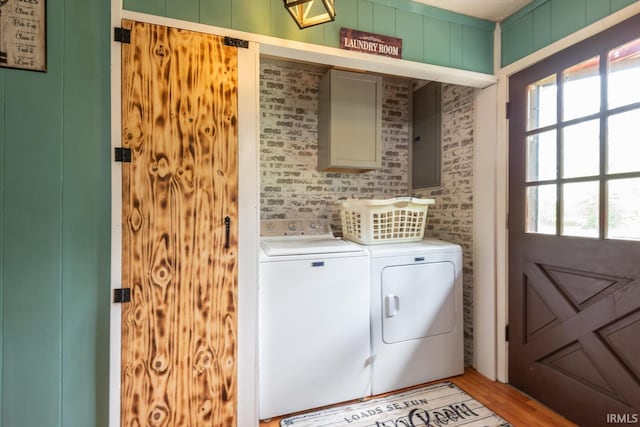 3907 N Caldwell Rd, Paragon, IN 46166 - washroom with independent washer and dryer, healthy amount of natural light, and light wood finished floors
