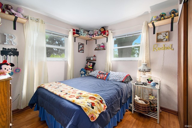 13495 N Hillside Dr, Syracuse, IN 46567 - bedroom featuring wood finished floors