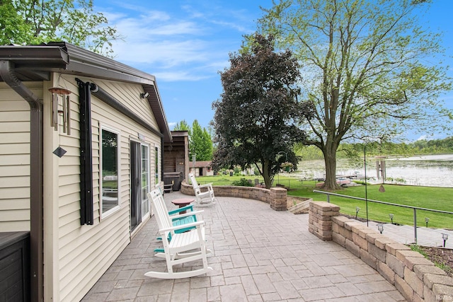 13495 N Hillside Dr, Syracuse, IN 46567 - view of patio / terrace with a water view