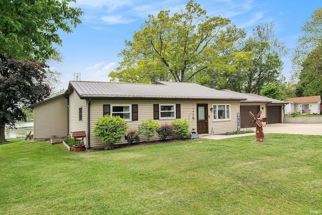 13495 N Hillside Dr, Syracuse, IN 46567 - ranch-style house with concrete driveway, a front lawn, an attached garage, and metal roof