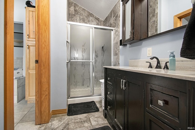13495 N Hillside Dr, Syracuse, IN 46567 - full bath with vanity, a stall shower, vaulted ceiling, a textured ceiling, and baseboards