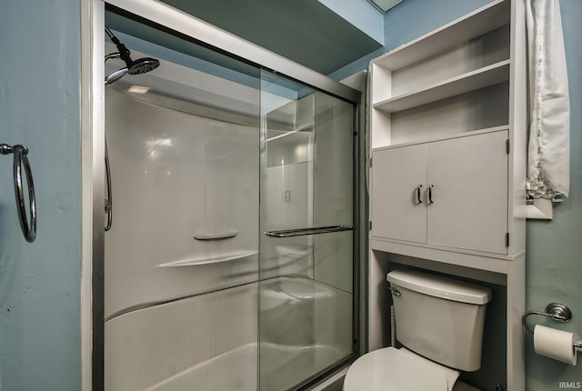 411 E Silver St, Bluffton, IN 46714 - bathroom featuring a shower stall and toilet