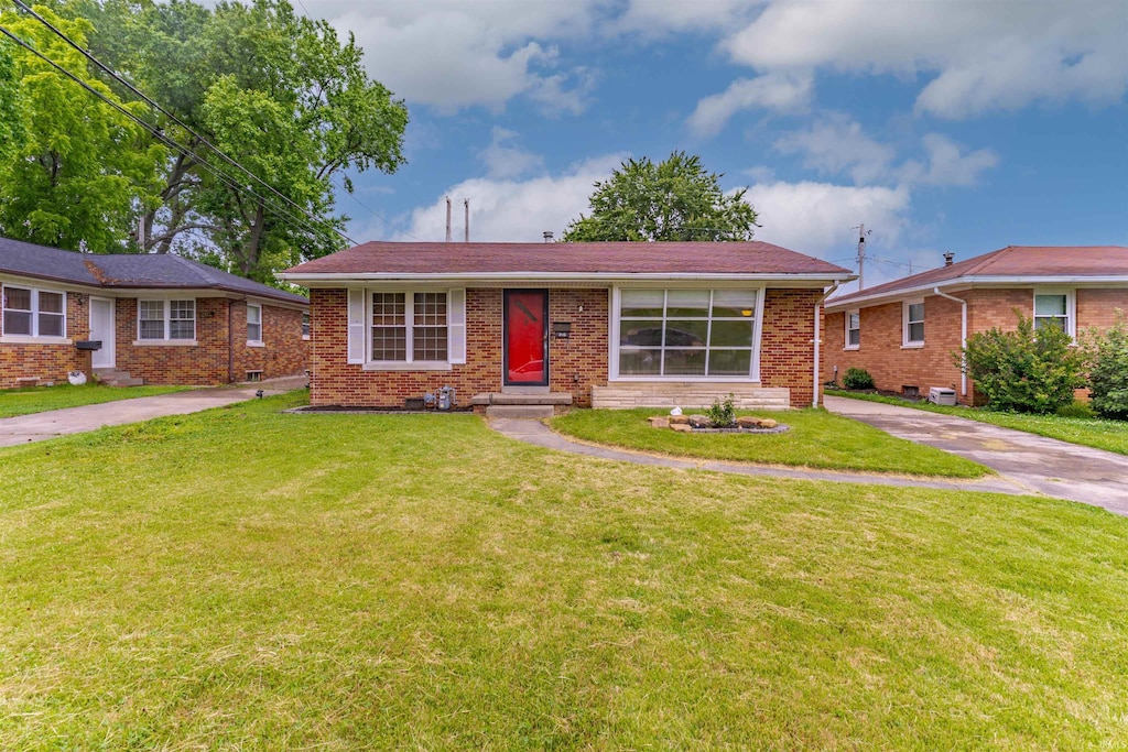 2116 Adams Ave, Evansville, IN 47714 - view of front of house featuring a front lawn and brick siding