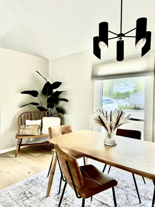 408 E Greenwalt St, North Webster, IN 46555 - dining space featuring wood finished floors and baseboards