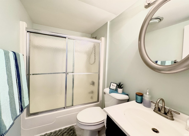 408 E Greenwalt St, North Webster, IN 46555 - full bathroom featuring vanity, bath / shower combo with glass door, and toilet