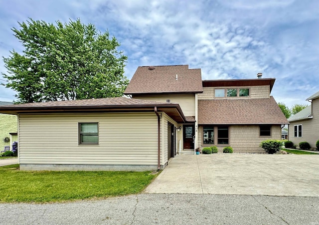 408 E Greenwalt St, North Webster, IN 46555 - view of front facade featuring a shingled roof