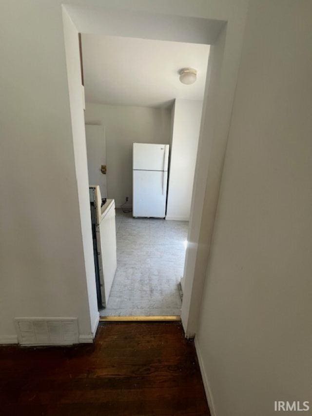 1512 Marine St, South Bend, IN 46613 - hall with wood finished floors and baseboards