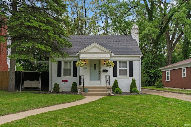 1324 Maple Ave, Fort Wayne, IN 46807 - bungalow-style home featuring a chimney and a shingled roof