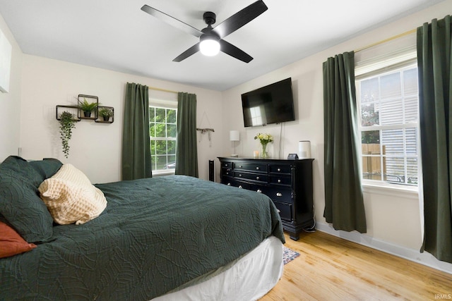 1324 Maple Ave, Fort Wayne, IN 46807 - bedroom featuring light wood-style flooring, baseboards, and ceiling fan
