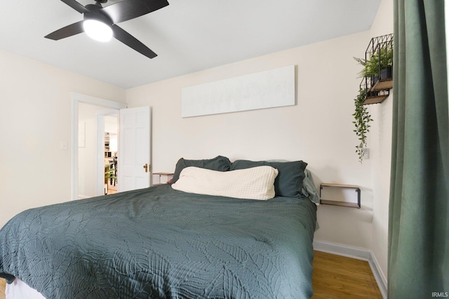 1324 Maple Ave, Fort Wayne, IN 46807 - bedroom featuring wood finished floors, baseboards, and ceiling fan