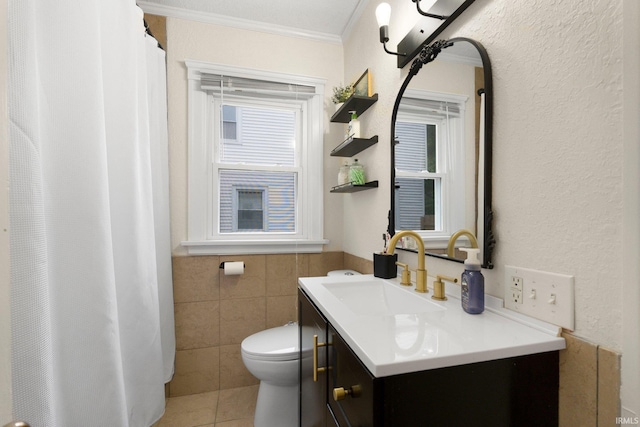1324 Maple Ave, Fort Wayne, IN 46807 - full bath with vanity, ornamental molding, toilet, tile walls, and tile patterned flooring