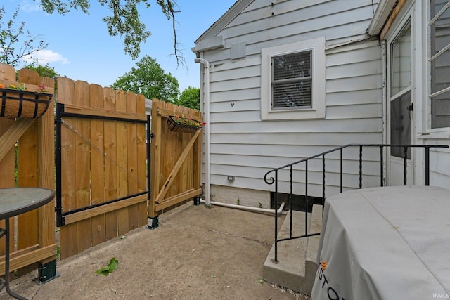 1324 Maple Ave, Fort Wayne, IN 46807 - view of patio featuring a gate