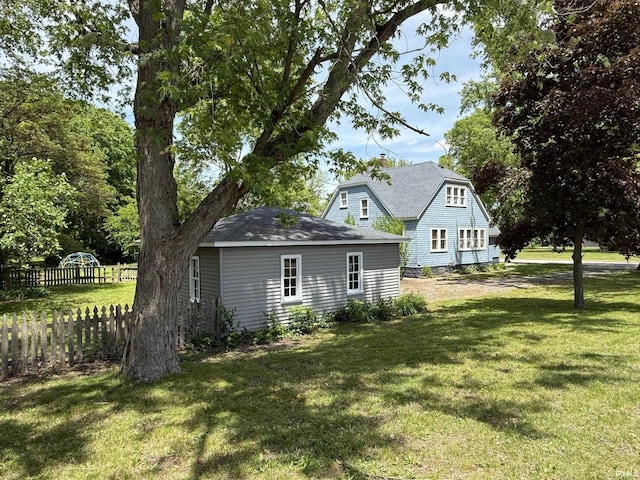 502 Keller St, North Judson, IN 46366 - view of side of property with roof with shingles