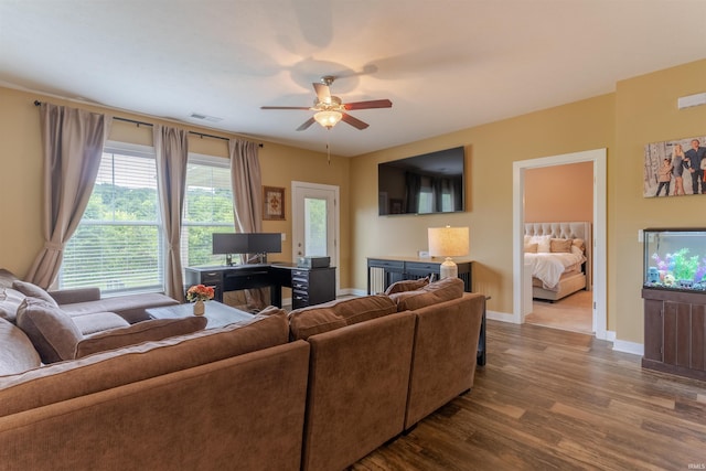 5350 Cameo Dr, Evansville, IN 47711 - living room featuring dark wood finished floors, ceiling fan, and baseboards