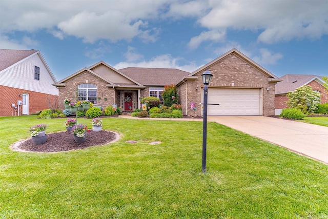 9142 Hartwell Dr, Evansville, IN 47725 - single story home with brick siding, an attached garage, concrete driveway, and a front lawn