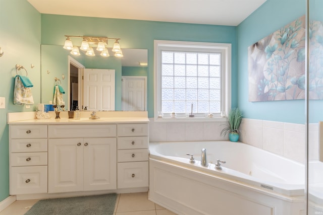 9142 Hartwell Dr, Evansville, IN 47725 - full bathroom with vanity, a tub with jets, and tile patterned flooring