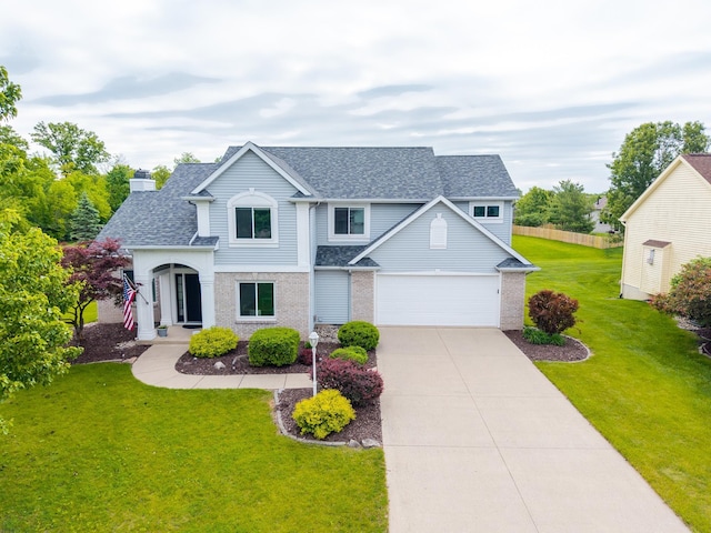 3513 Crater Cv, Fort Wayne, IN 46804 - traditional-style house with a shingled roof, driveway, a chimney, and a garage