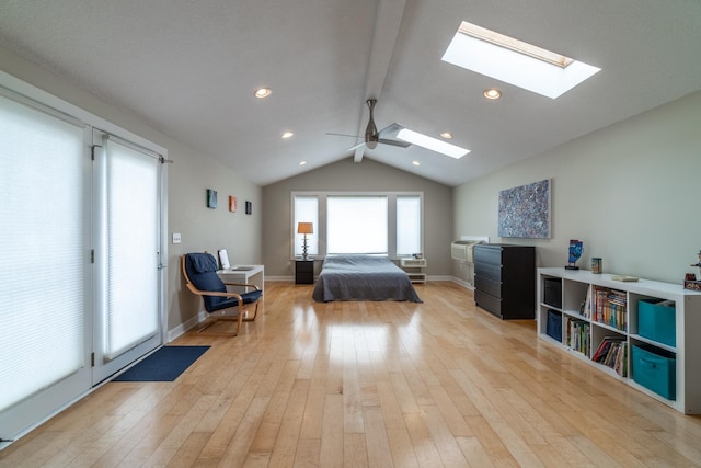 3513 Crater Cv, Fort Wayne, IN 46804 - bedroom featuring a skylight, light wood-style floors, a ceiling fan, and baseboards