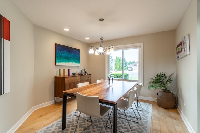 3513 Crater Cv, Fort Wayne, IN 46804 - dining room featuring light wood-style floors, recessed lighting, baseboards, and a chandelier