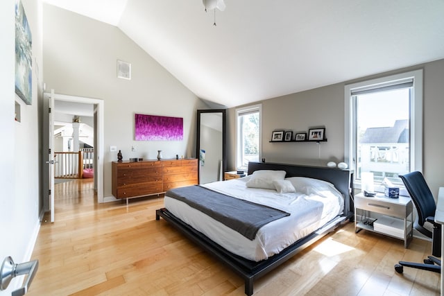 3513 Crater Cv, Fort Wayne, IN 46804 - bedroom featuring light wood finished floors, lofted ceiling, baseboards, and an office area