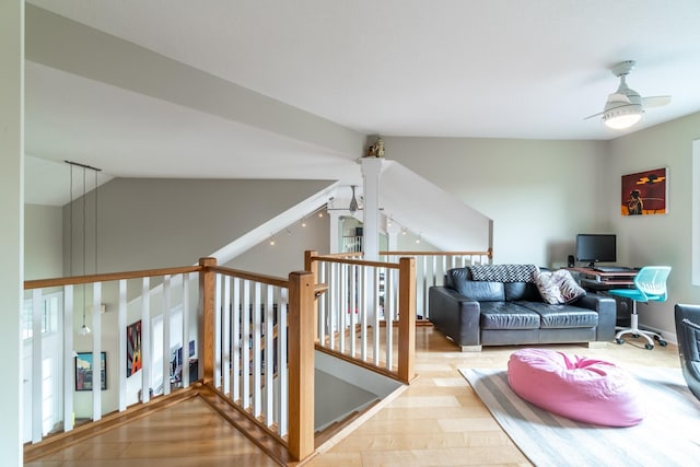 3513 Crater Cv, Fort Wayne, IN 46804 - living room featuring a ceiling fan, wood finished floors, and lofted ceiling