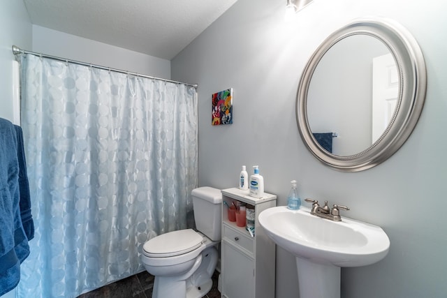 3513 Crater Cv, Fort Wayne, IN 46804 - bathroom featuring toilet, curtained shower, and a sink