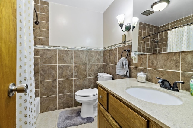 1875 N Michael Dr, Marion, IN 46952 - full bath with tile walls, vanity, a shower with curtain, and toilet