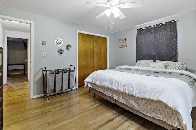 1875 N Michael Dr, Marion, IN 46952 - bedroom featuring light wood-style floors, a closet, and a ceiling fan