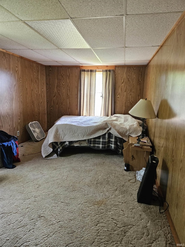 115 High St, Geneva, IN 46740 - carpeted bedroom featuring wooden walls and a paneled ceiling