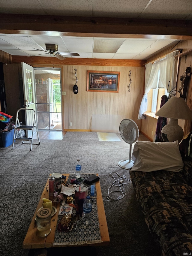 115 High St, Geneva, IN 46740 - living area featuring carpet, wooden walls, and ceiling fan