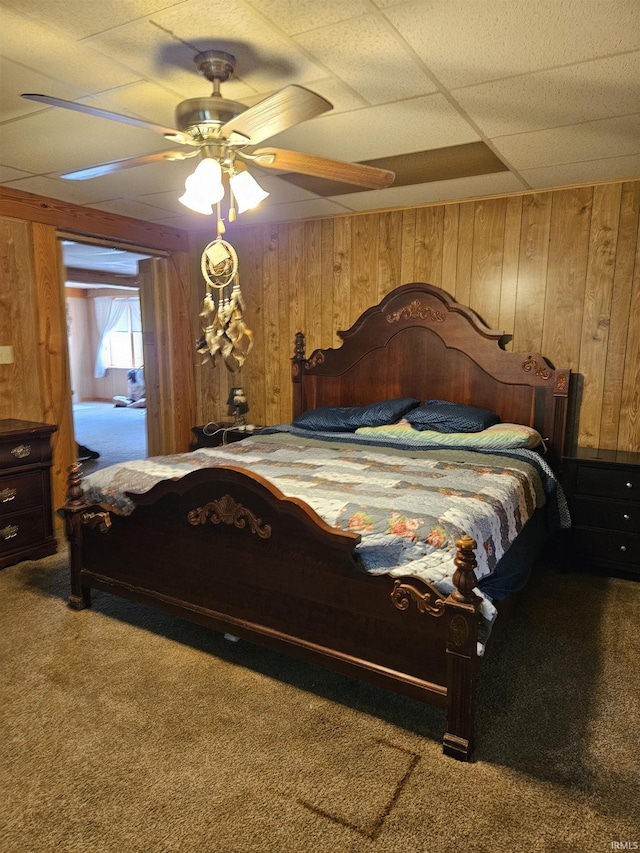 115 High St, Geneva, IN 46740 - carpeted bedroom with wooden walls and ceiling fan