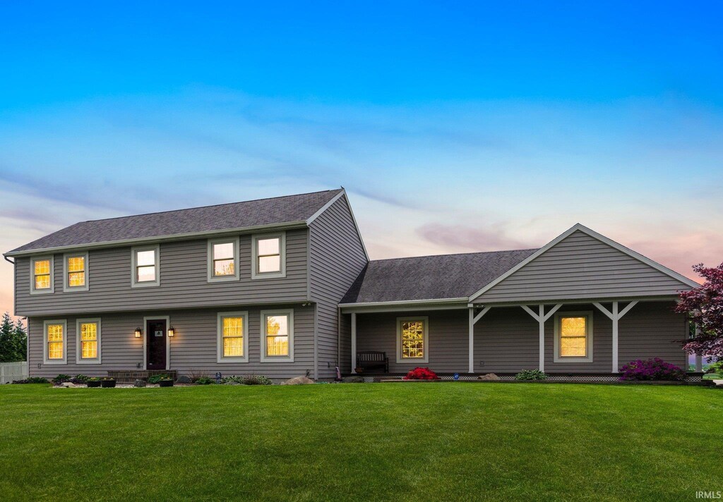 7800 E 400 S-92, Fort Wayne, IN 46818 - view of front of property featuring a front yard and a shingled roof