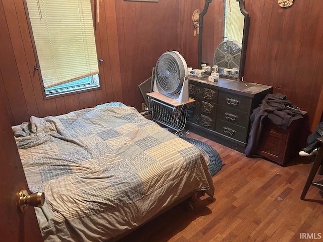 2216 N Philips St, Kokomo, IN 46901 - bedroom featuring wood finished floors and wooden walls