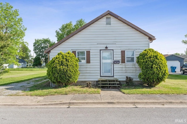 718 Center St, New Haven, IN 46774 - bungalow featuring entry steps and a front lawn