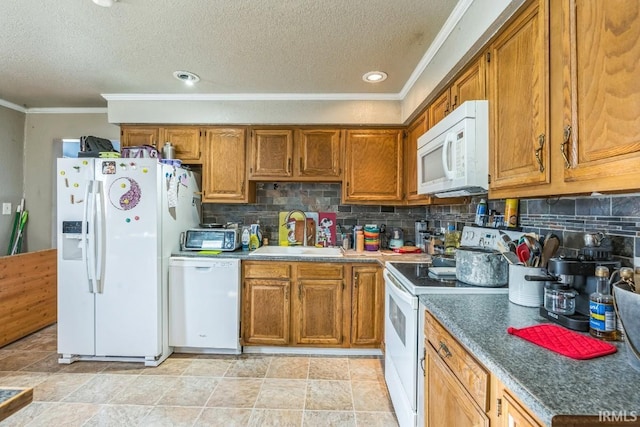 718 Center St, New Haven, IN 46774 - kitchen featuring white appliances, a sink, crown molding, brown cabinets, and a textured ceiling