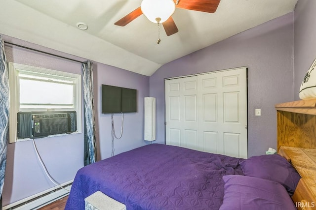 718 Center St, New Haven, IN 46774 - bedroom with baseboard heating, vaulted ceiling, a closet, ceiling fan, and cooling unit