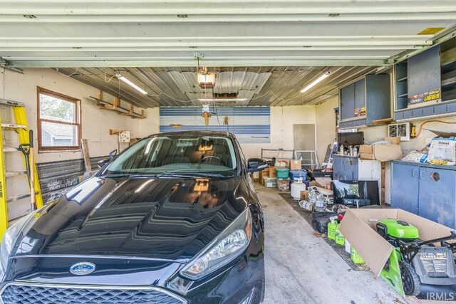 718 Center St, New Haven, IN 46774 - garage featuring a garage door opener