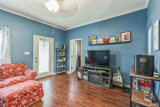 718 Center St, New Haven, IN 46774 - living area with ornamental molding, wood finished floors, a ceiling fan, and baseboards