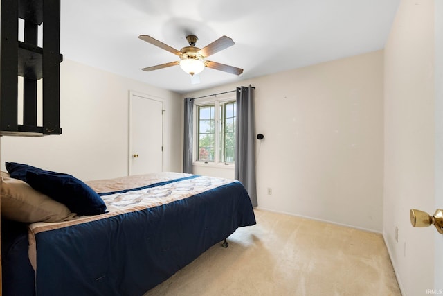 405 Inglenook Pl, Angola, IN 46703 - bedroom with light colored carpet and ceiling fan