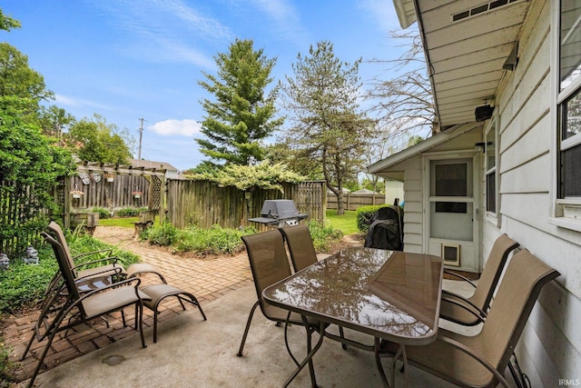 405 Inglenook Pl, Angola, IN 46703 - fenced backyard featuring a patio area and a grill