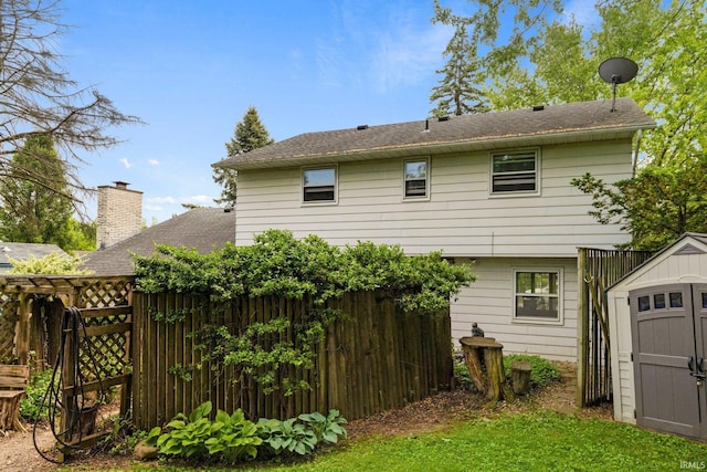 405 Inglenook Pl, Angola, IN 46703 - rear view of property with a chimney