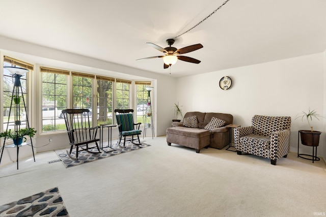 405 Inglenook Pl, Angola, IN 46703 - living area featuring carpet, plenty of natural light, and a ceiling fan