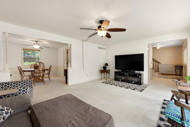 405 Inglenook Pl, Angola, IN 46703 - living room with a ceiling fan, carpet, and stairway