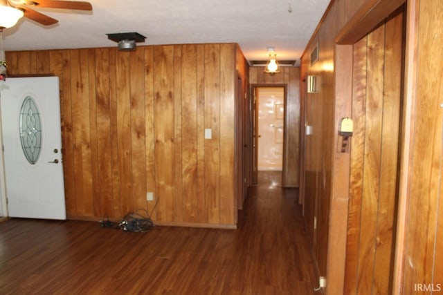 4283 E Ramp Creek Rd, Bloomington, IN 47401 - entryway featuring wood finished floors, wooden walls, and ceiling fan
