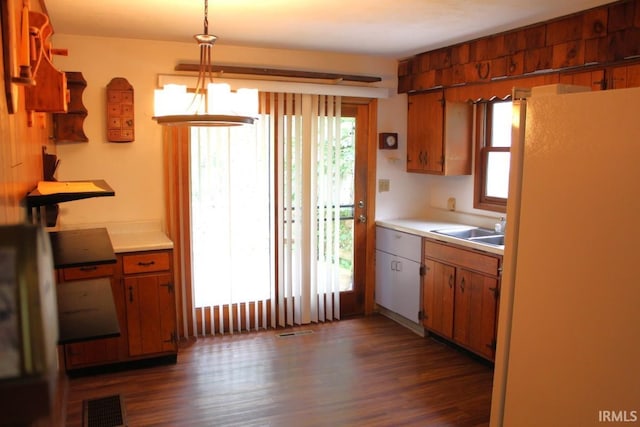 4283 E Ramp Creek Rd, Bloomington, IN 47401 - kitchen featuring freestanding refrigerator, a sink, dark wood-style floors, and light countertops