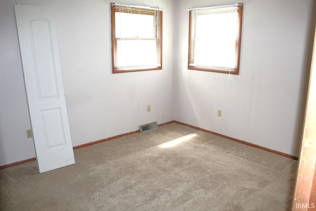 4283 E Ramp Creek Rd, Bloomington, IN 47401 - unfurnished bedroom with carpet floors and baseboards